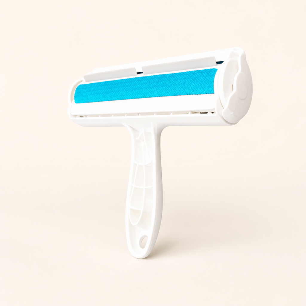 Whisker & Wow pet hair remover roller in blue on a cream background