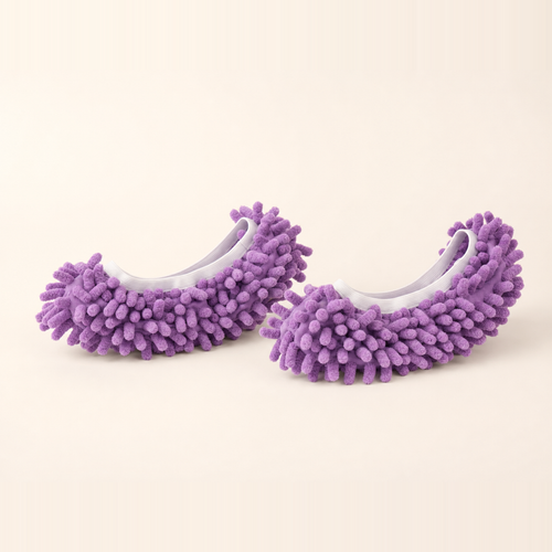 Whisker & Wow fur-catching slippers in violet on a cream background